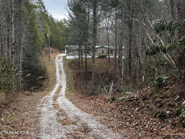 5 Acres of Residential Land with Home for Sale in Tellico Plains, Tennessee