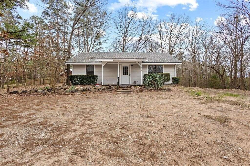 2 Acres of Residential Land with Home for Sale in Powderly, Texas