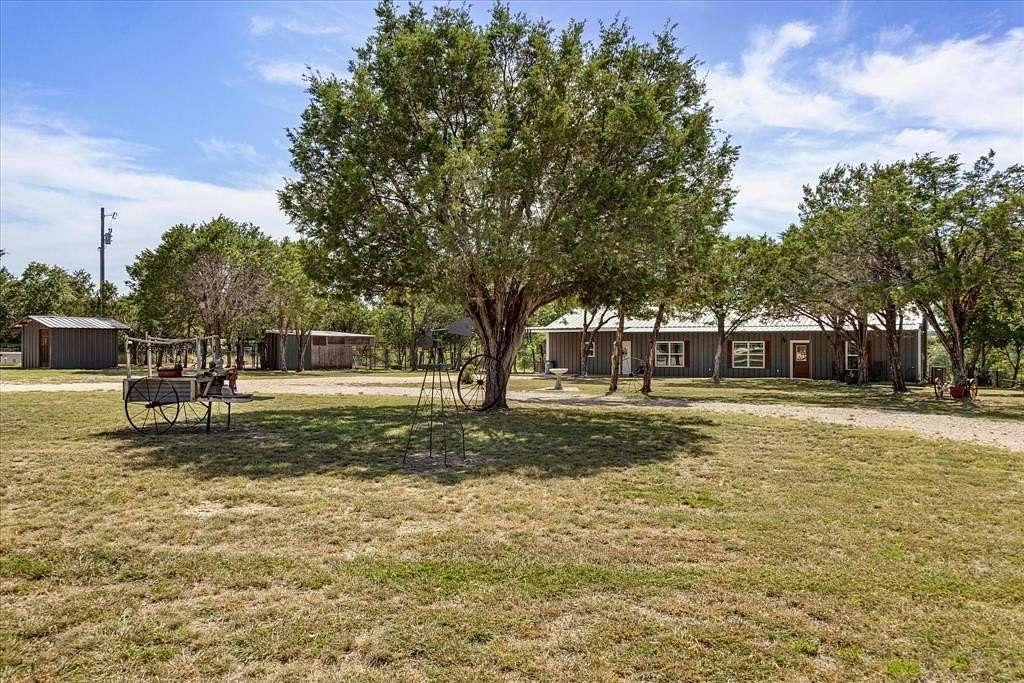 2 Acres of Residential Land with Home for Sale in Bluff Dale, Texas