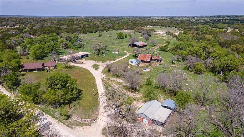 56.8 Acres of Recreational Land with Home for Sale in Hico, Texas