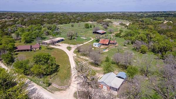 56.8 Acres of Recreational Land with Home for Sale in Hico, Texas