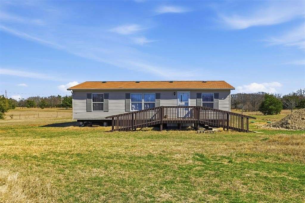 5.69 Acres of Land with Home for Sale in Bonham, Texas