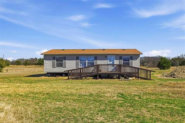 5.69 Acres of Land with Home for Sale in Bonham, Texas