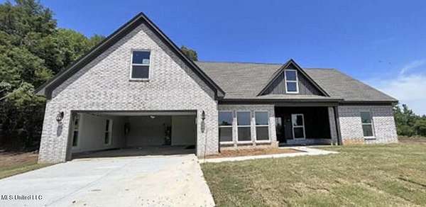 4.5 Acres of Residential Land with Home for Sale in Coldwater, Mississippi