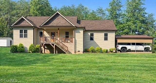 9.24 Acres of Residential Land with Home for Sale in Walnut Cove, North Carolina