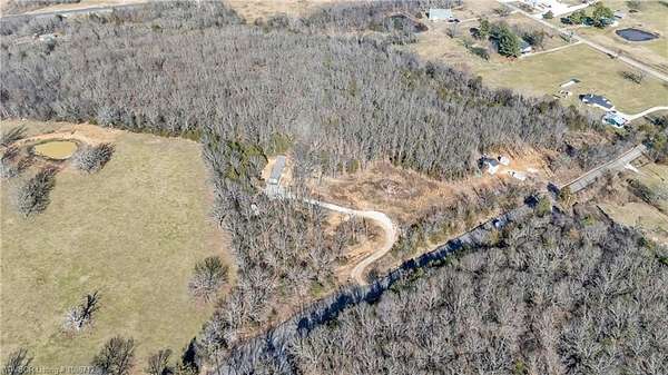 3.7 Acres of Land with Home for Sale in Prairie Grove, Arkansas