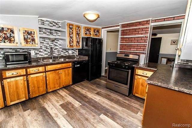 15.7 Acres of Land with Home for Sale in Otter Lake, Michigan