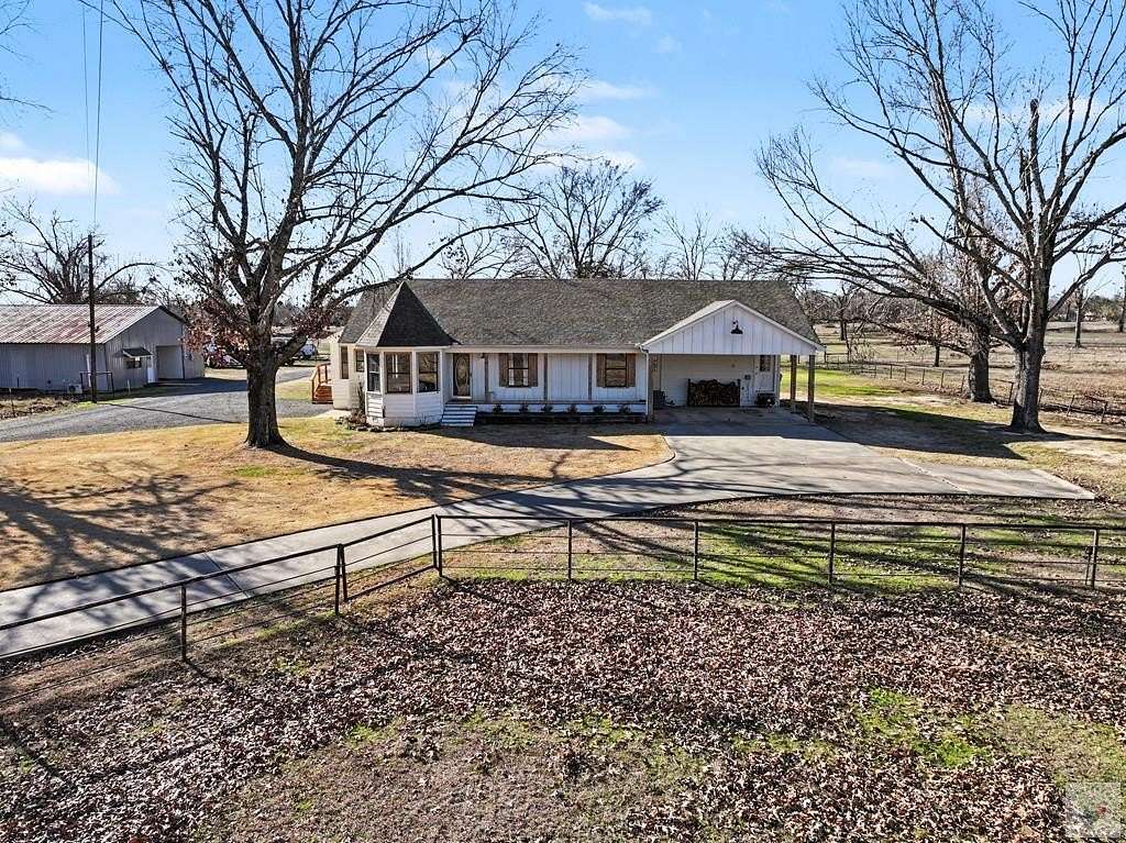 14.4 Acres of Land with Home for Sale in New Boston, Texas