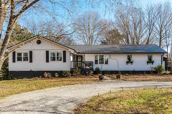 2.1 Acres of Residential Land with Home for Sale in Castalian Springs, Tennessee