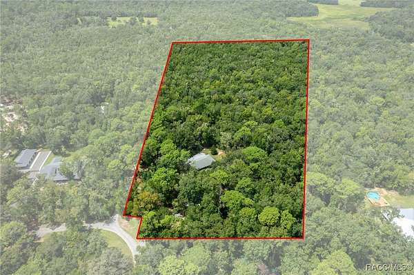 4.9 Acres of Residential Land with Home for Sale in Brooksville, Florida