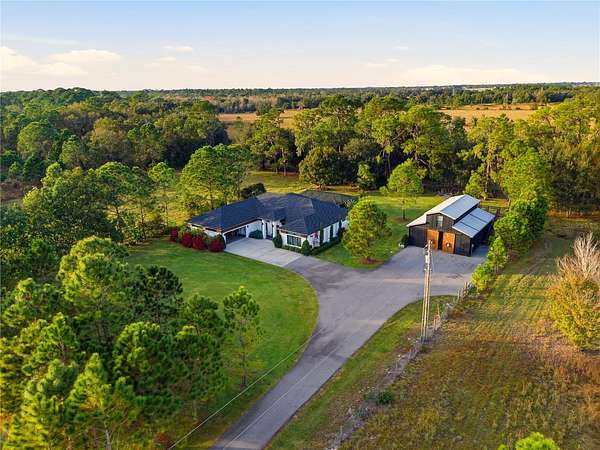 30.4 Acres of Land with Home for Sale in Winter Haven, Florida