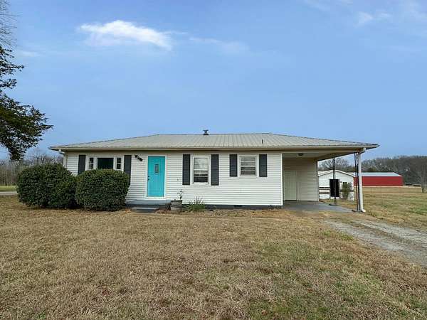 7.16 Acres of Residential Land with Home for Sale in Savannah, Tennessee