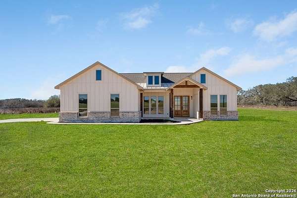 1.54 Acres of Residential Land with Home for Sale in Poteet, Texas