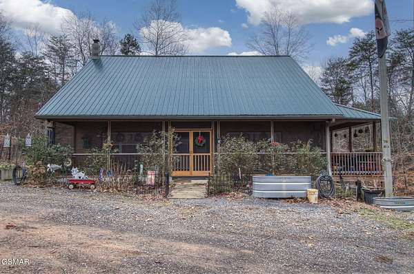 12.2 Acres of Land with Home for Sale in Kodak, Tennessee