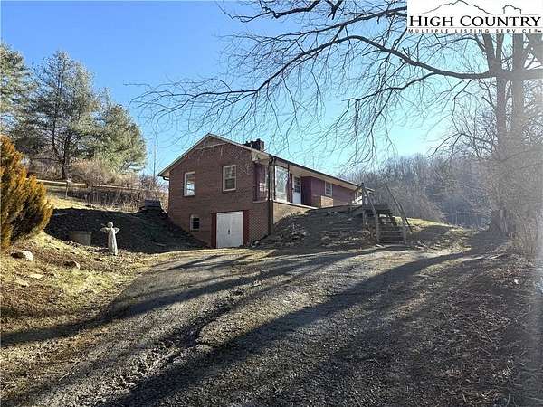 2.48 Acres of Land with Home for Sale in Grassy Creek, North Carolina