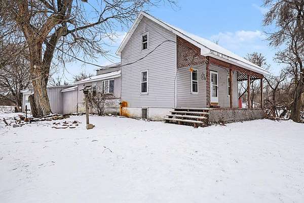 5 Acres of Residential Land with Home for Sale in Beaverton, Michigan