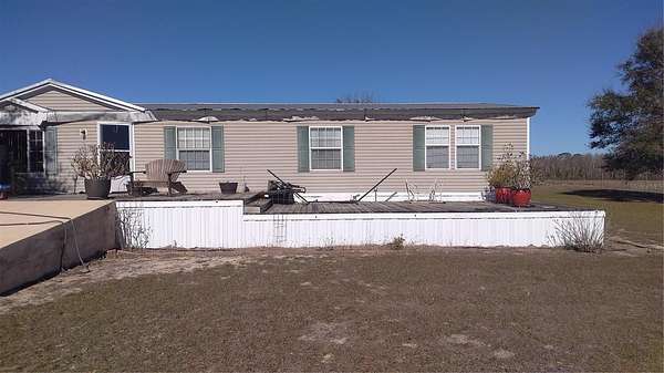 39.2 Acres of Agricultural Land with Home for Sale in Fort Meade, Florida