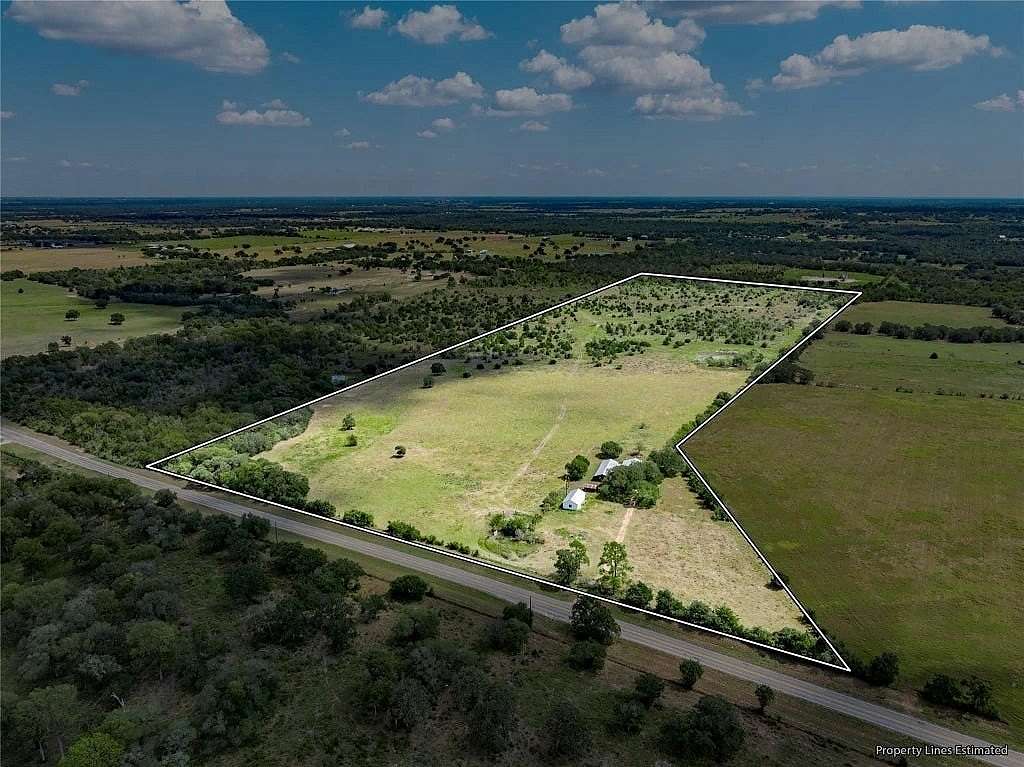 63.5 Acres of Agricultural Land with Home for Sale in Ledbetter, Texas