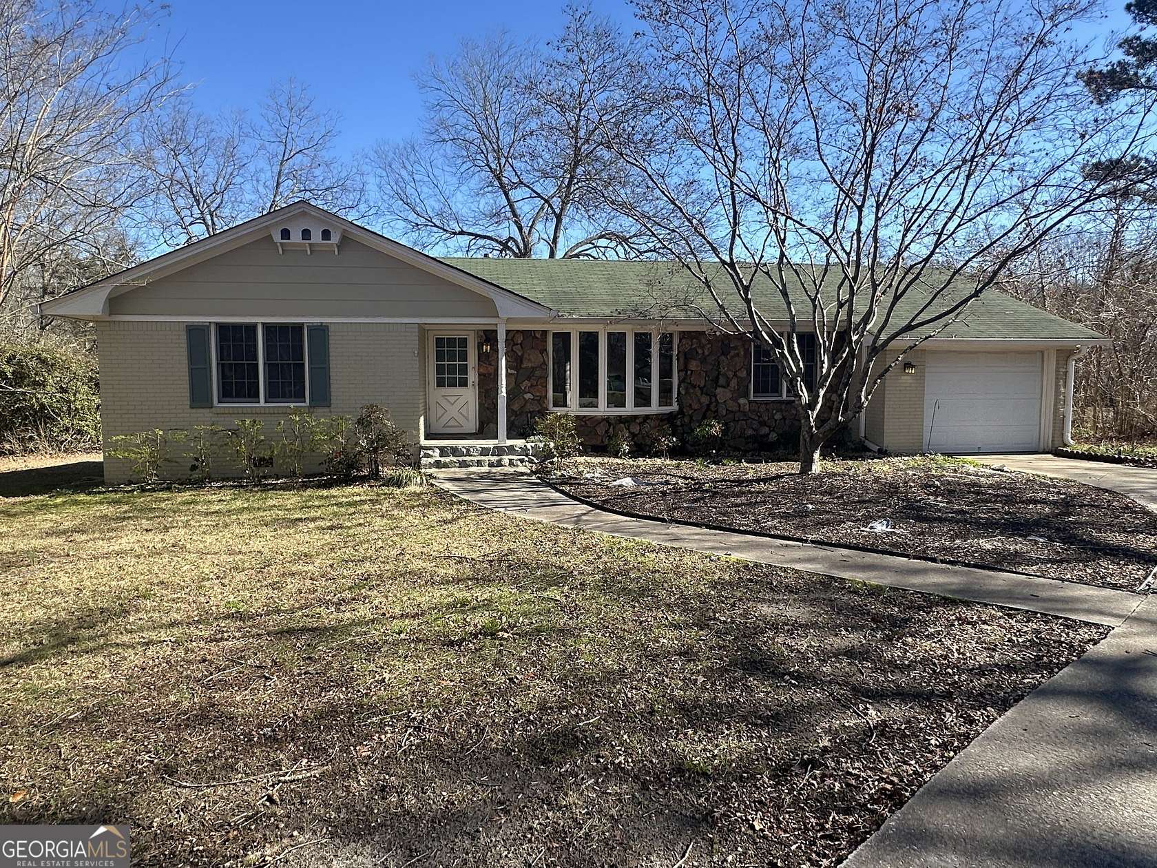 3.6 Acres of Residential Land with Home for Sale in Locust Grove, Georgia