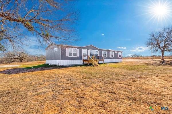 6.27 Acres of Residential Land with Home for Sale in Lockhart, Texas