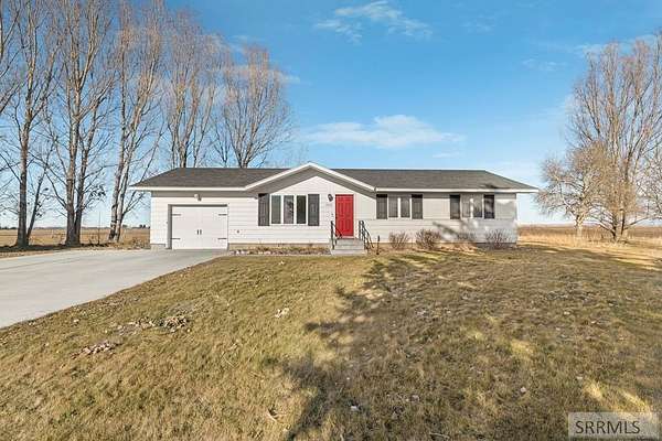 1.55 Acres of Residential Land with Home for Sale in Sugar City, Idaho