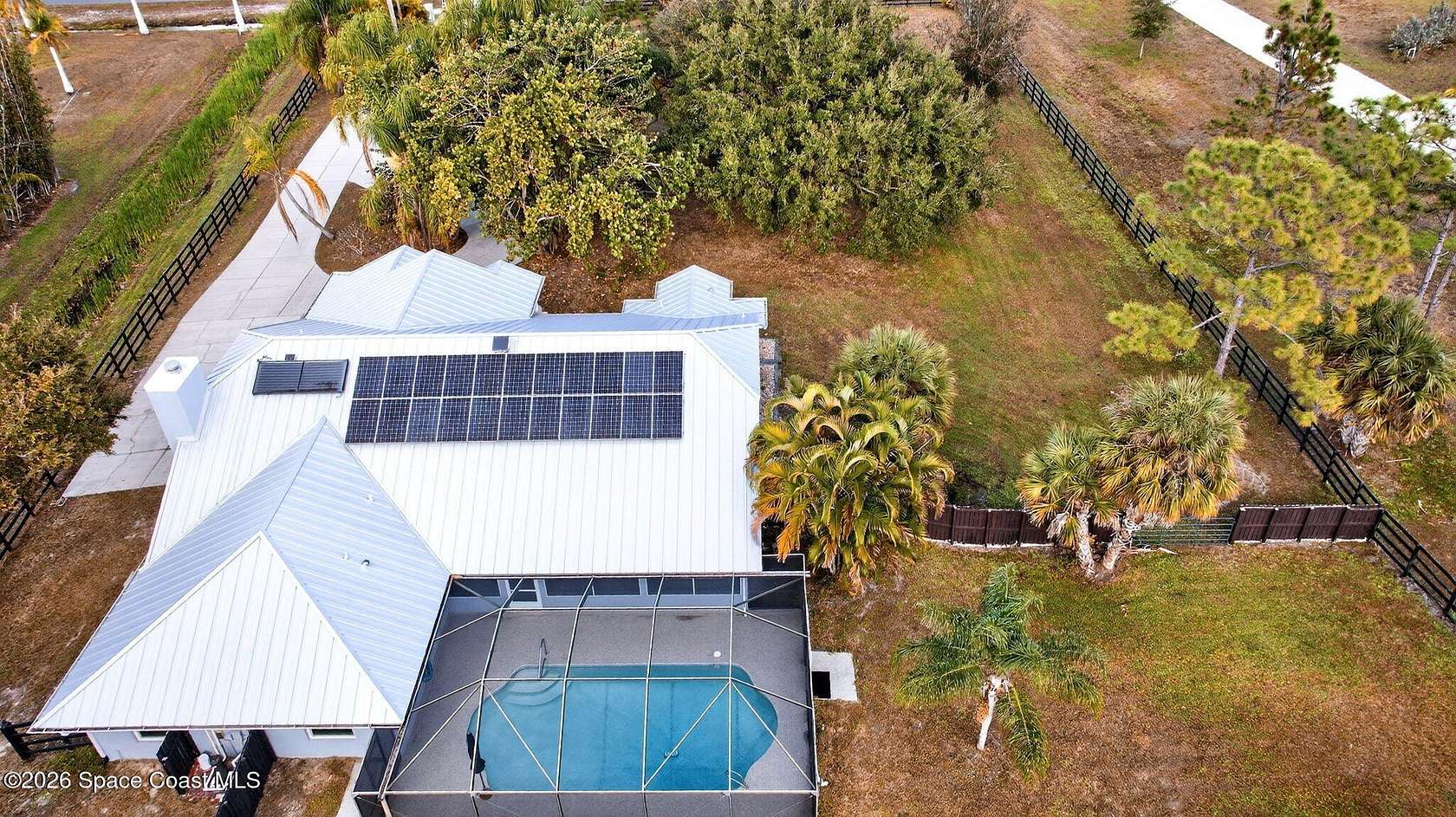 2.63 Acres of Land with Home for Sale in Palm Bay, Florida