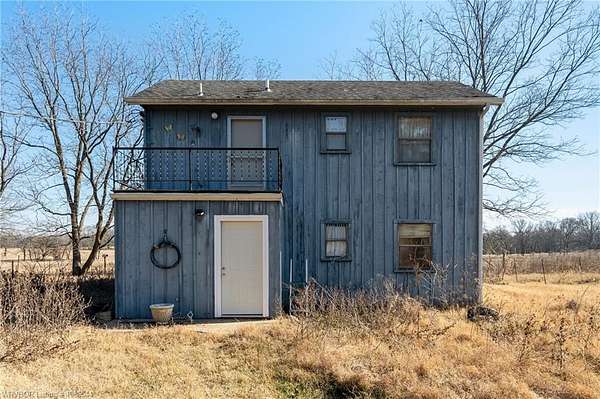 20 Acres of Agricultural Land with Home for Auction in Bokoshe, Oklahoma