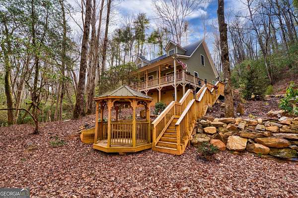 5 Acres of Residential Land with Home for Sale in Ellijay, Georgia