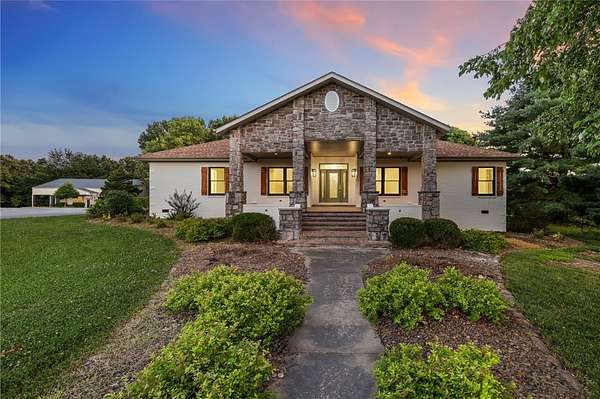 4.5 Acres of Land with Home for Sale in Gravette, Arkansas