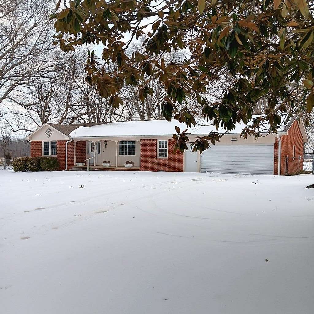 1.89 Acres of Land with Home for Sale in Cottage Grove, Tennessee