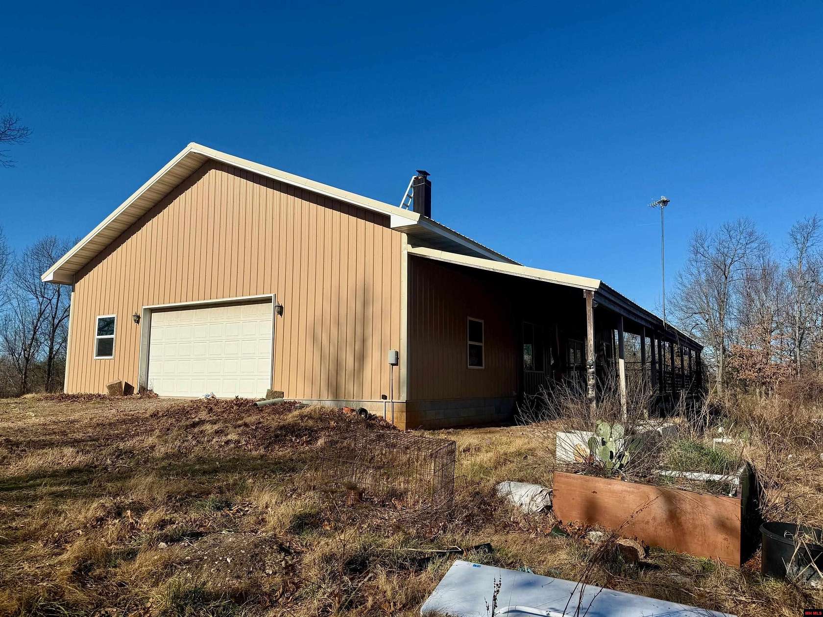 65.8 Acres of Land with Home for Sale in Yellville, Arkansas