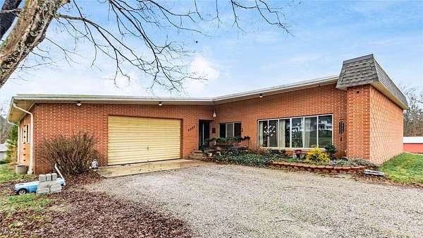 1.77 Acres of Residential Land with Home for Sale in Zanesville, Ohio