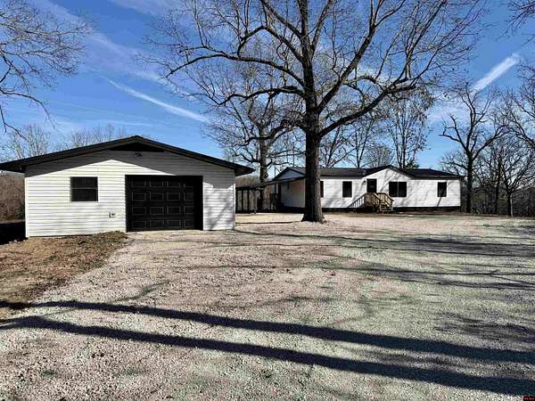 3.88 Acres of Land with Home for Sale in Mountain Home, Arkansas