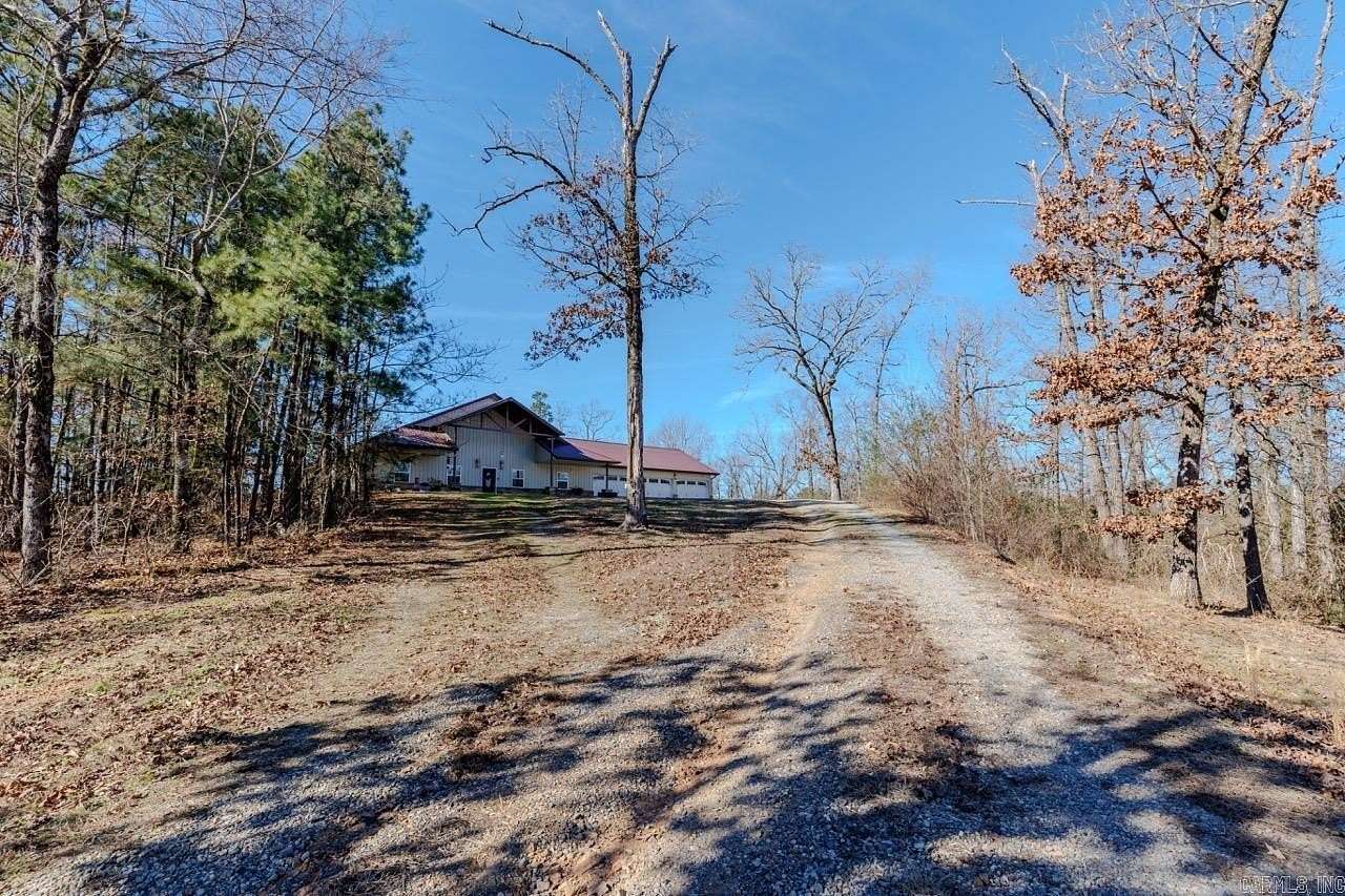 4.59 Acres of Land with Home for Sale in Perryville, Arkansas