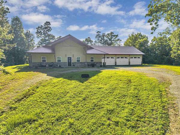 4.59 Acres of Land with Home for Sale in Perryville, Arkansas