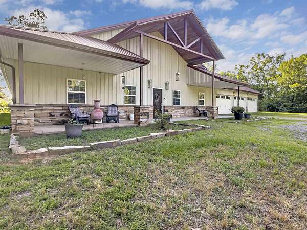4.59 Acres of Land with Home for Sale in Perryville, Arkansas