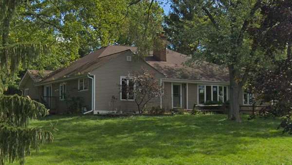 1.52 Acres of Residential Land with Home for Sale in Downers Grove, Illinois