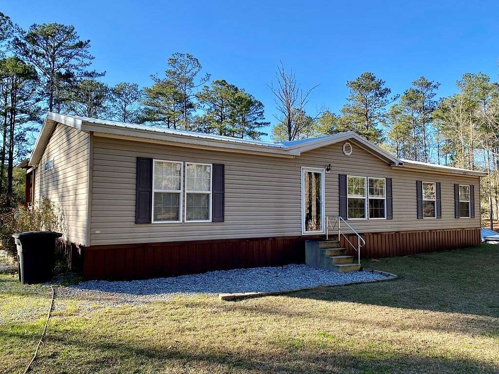 8.67 Acres of Land with Home for Sale in Carriere, Mississippi