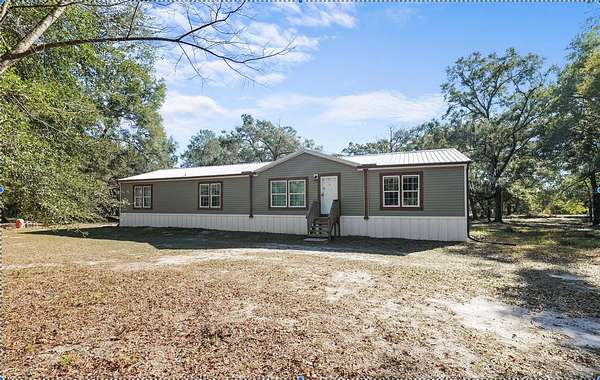 5 Acres of Land with Home for Sale in Spring Hill, Florida