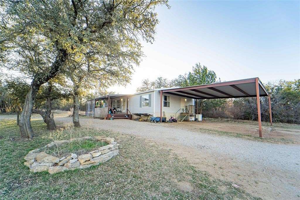 2 Acres of Residential Land with Home for Sale in Breckenridge, Texas