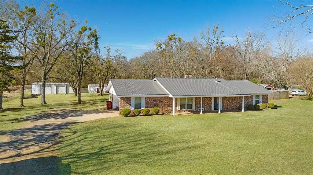 1.82 Acres of Residential Land with Home for Sale in Reno, Texas