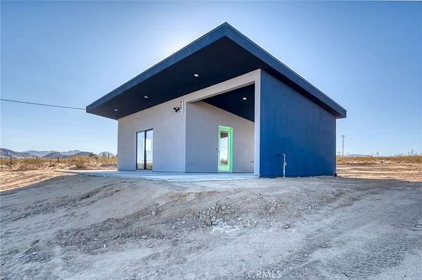 5 Acres of Residential Land with Home for Sale in Landers, California