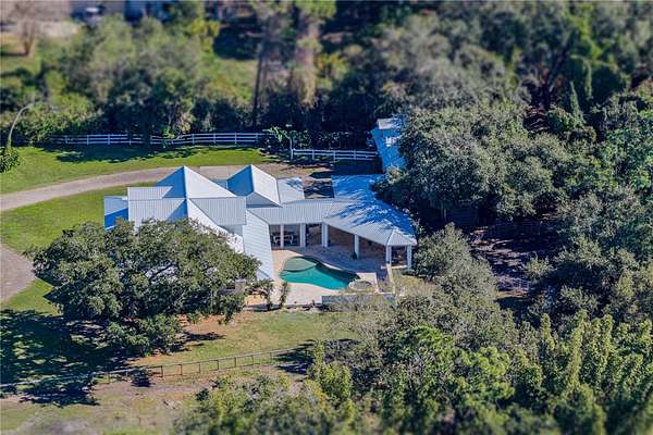 2.62 Acres of Residential Land with Home for Sale in Winter Haven, Florida