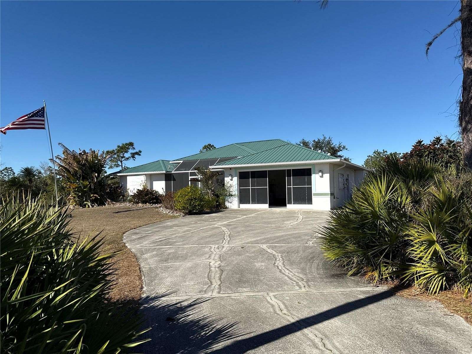 2.3 Acres of Residential Land with Home for Sale in Punta Gorda, Florida