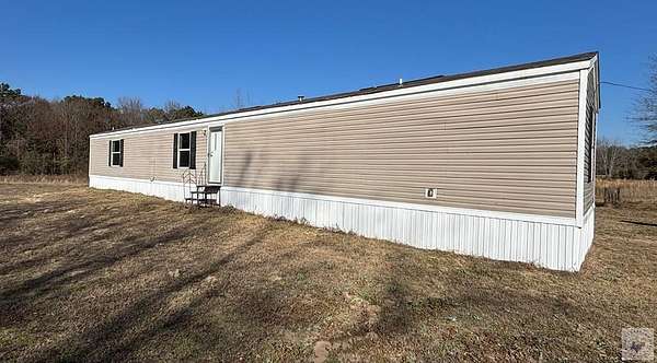 7 Acres of Residential Land with Home for Sale in New Boston, Texas