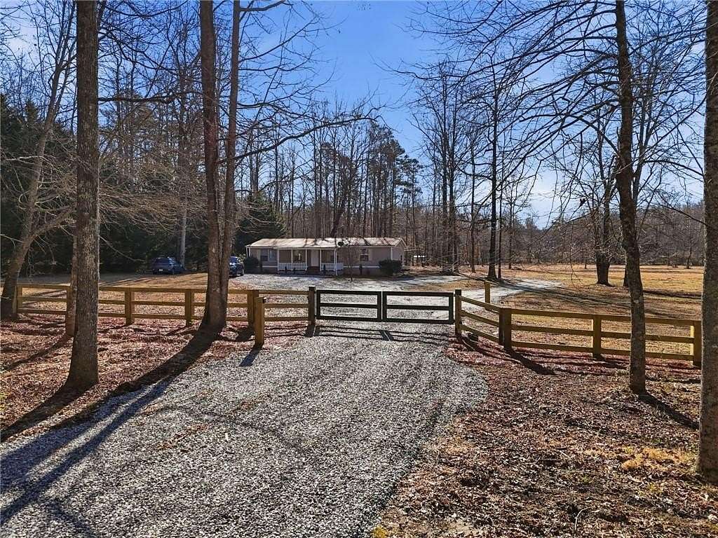 8 Acres of Land with Home for Sale in Dahlonega, Georgia
