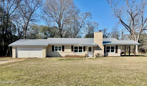 5.7 Acres of Residential Land with Home for Sale in Jayess, Mississippi