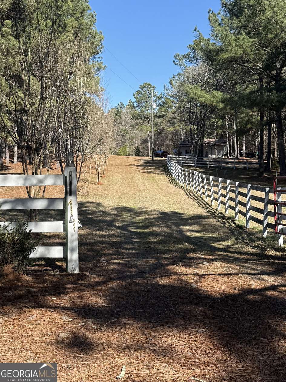 5 Acres of Residential Land with Home for Sale in Shady Dale, Georgia