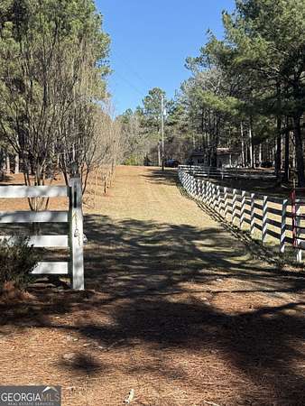 5 Acres of Residential Land with Home for Sale in Shady Dale, Georgia