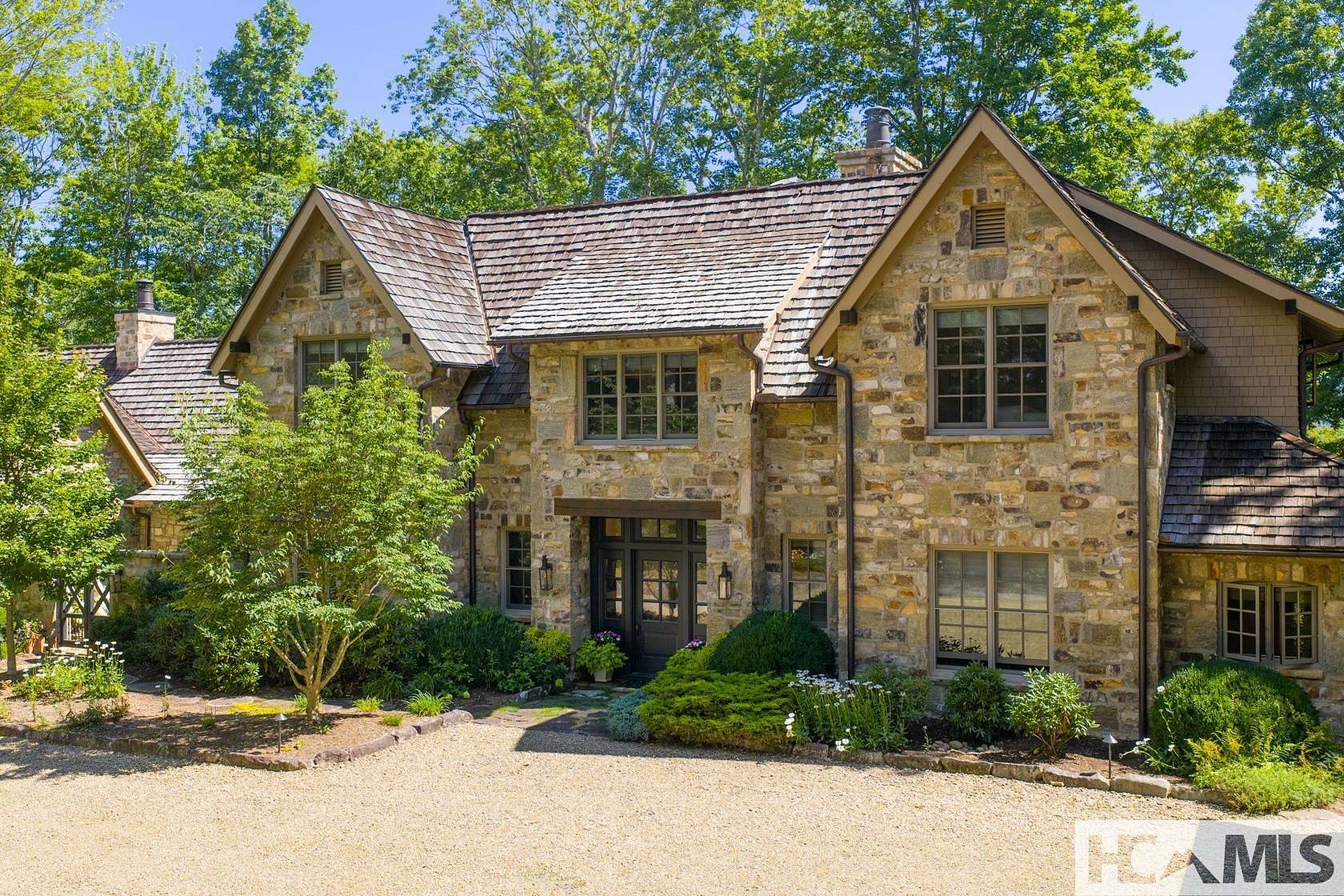 3.17 Acres of Land with Home for Sale in Cashiers, North Carolina